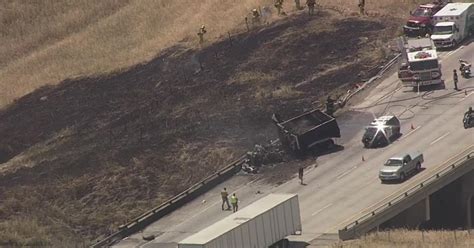 Big-rig fire on eastbound 580 in Livermore closes two lanes, spreads to hillside